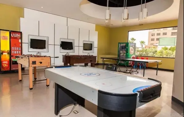 a room with gym equipment and a large window