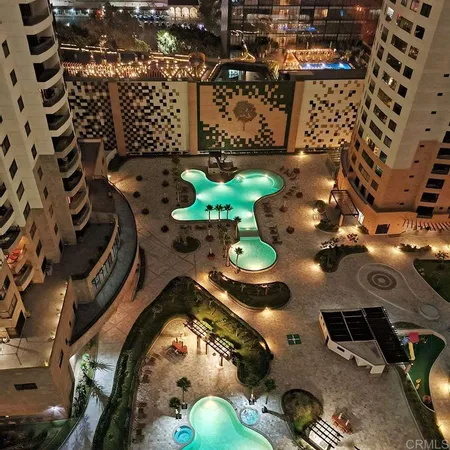 a kitchen with a refrigerator and a sink