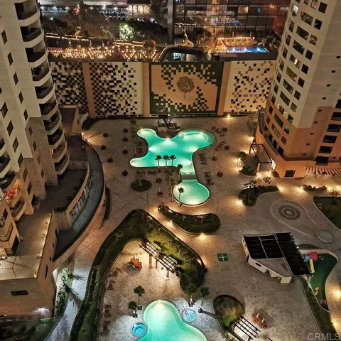 a kitchen with a refrigerator and a sink
