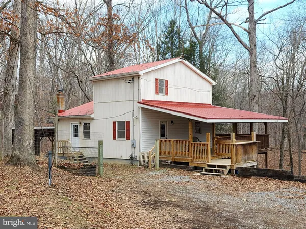 a view of house with a outdoor space