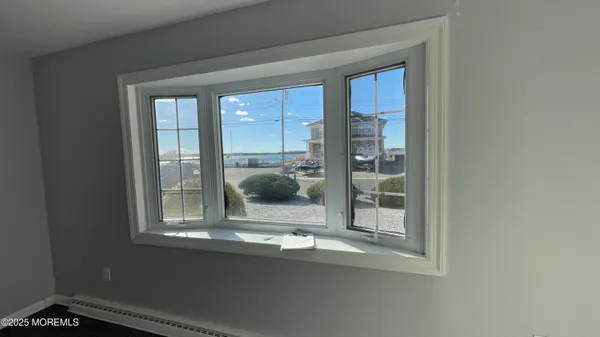 a room with window and door