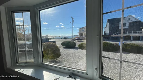 a view of a living room and window