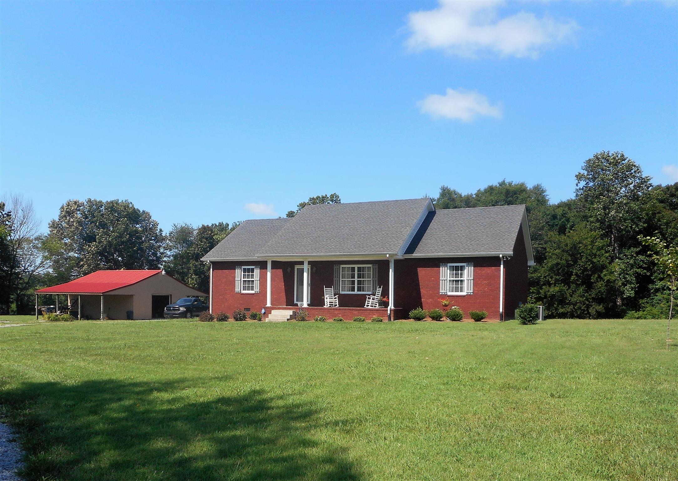 4202 Roy Cole Road Springfield, TN 37172 - Photo 2 of 17 a front view of house with yard and outdoor seating