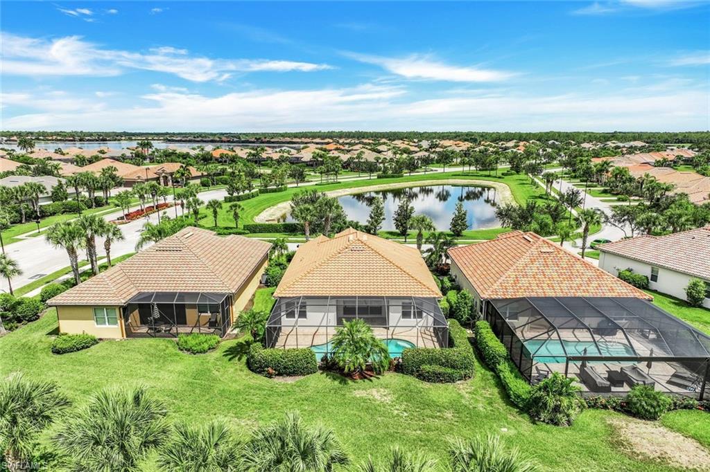 9062 Limestone Lane Naples, FL 34120 - Photo 29 of 48 an aerial view of residential houses with city view