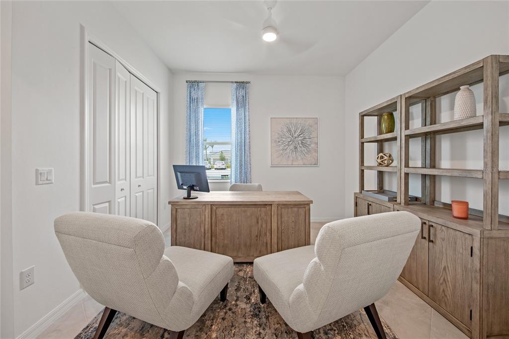 7161 Inlet Isles Lakewood Ranch, FL 34202 - Photo 20 of 29 a living room with furniture and a window