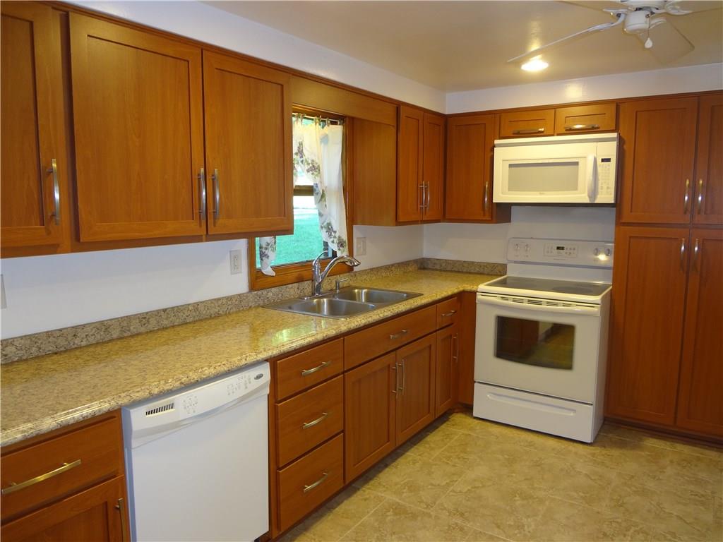 303 Madison Heights Road New Stanton, PA 15672 - Photo 14 of 23 Updated Kitchen with Lots of Cabinetry and Pantry.
