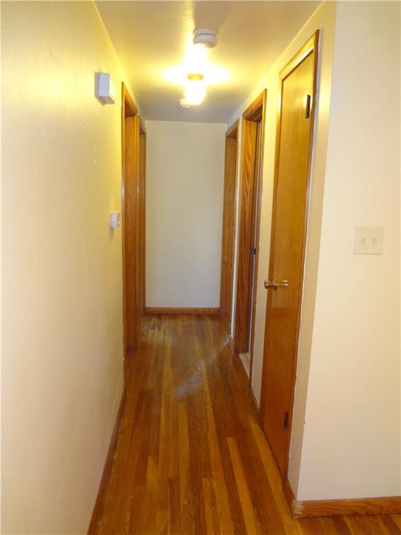 303 Madison Heights Road New Stanton, PA 15672 - Photo 16 of 23 Hallway to the Bedrooms and Bathroom.