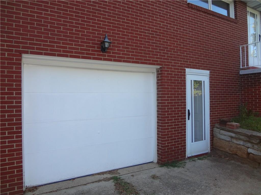 303 Madison Heights Road New Stanton, PA 15672 - Photo 23 of 23 Garage with Man Door to Family Room.