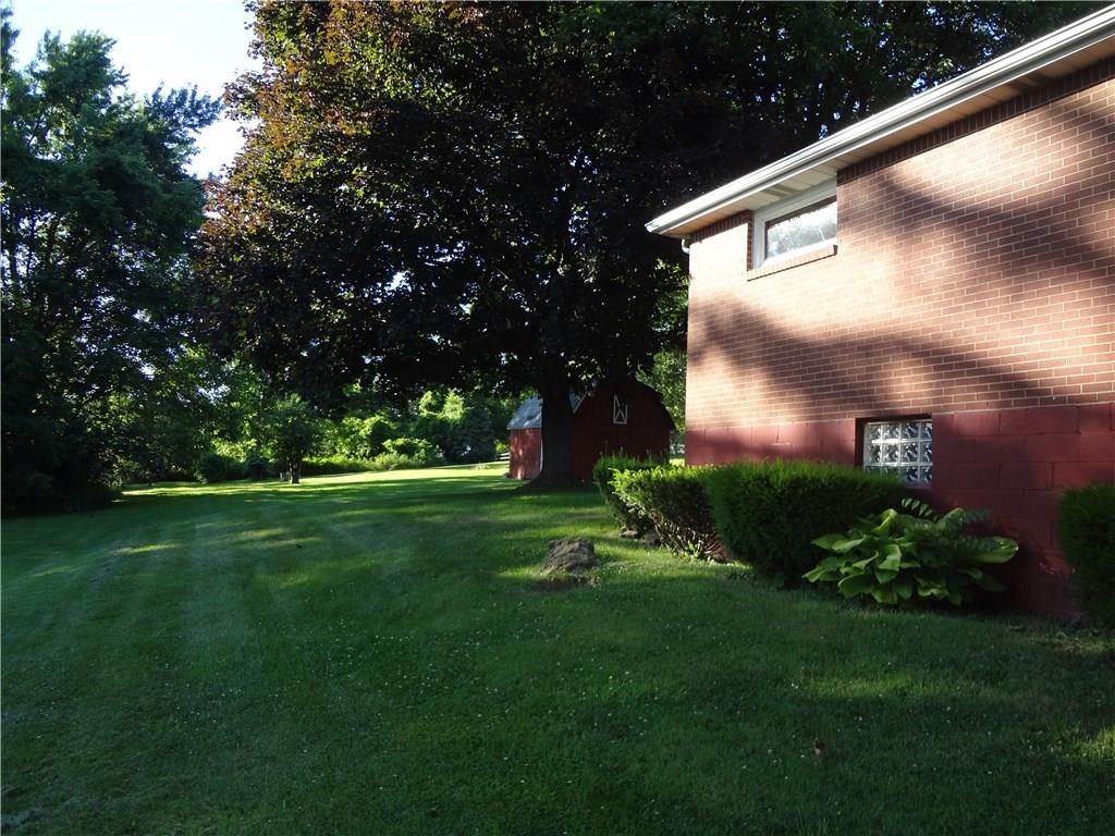 303 Madison Heights Road New Stanton, PA 15672 - Photo 4 of 23 Side Yard View.
