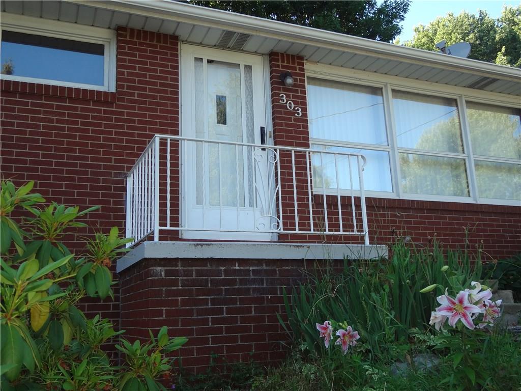 303 Madison Heights Road New Stanton, PA 15672 - Photo 10 of 23 Front Porch with Flower Garden below.