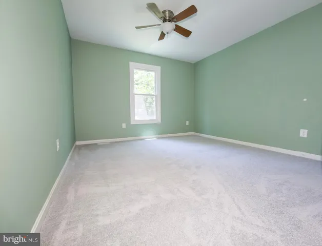 a view of balcony with deck and wooden floor