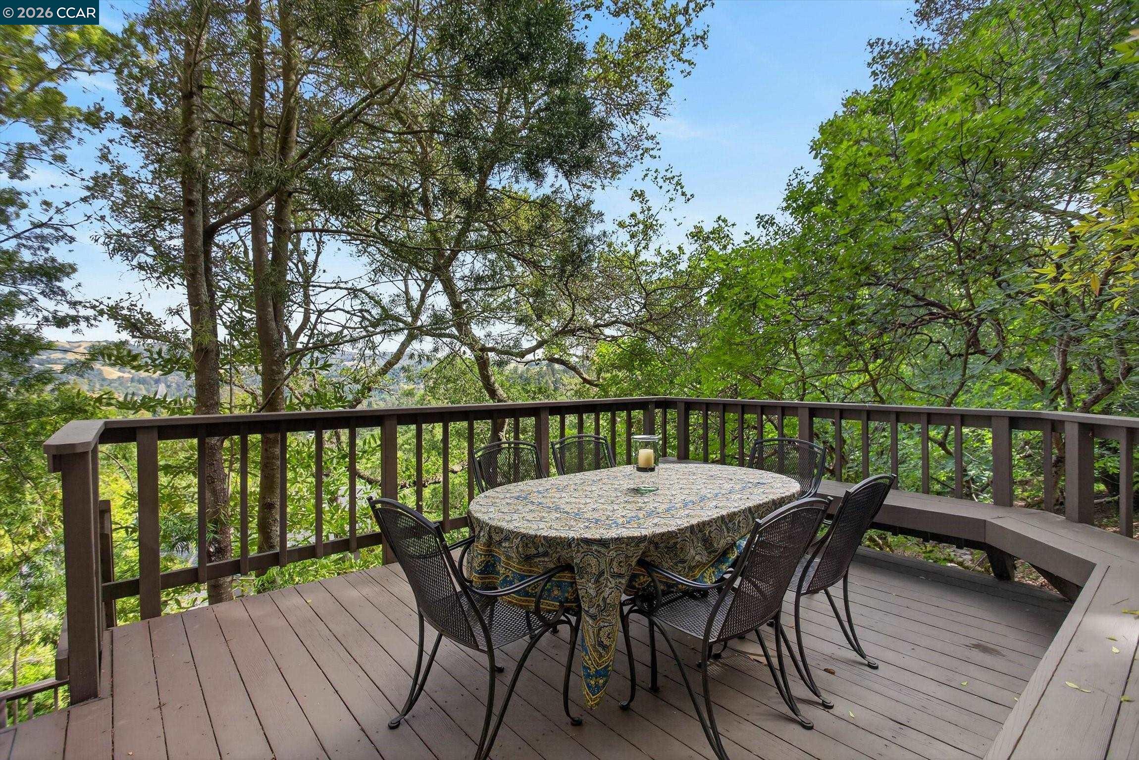 4105 Coralee Lane Lafayette, CA 94549 - Photo 36 of 43 a view of a wooden deck with a table and chairs