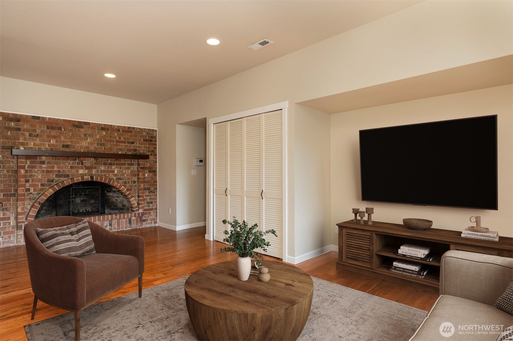 7923 220th Street Southwest Edmonds, WA 98026 - Photo 23 of 40 a living room with furniture and a flat screen tv