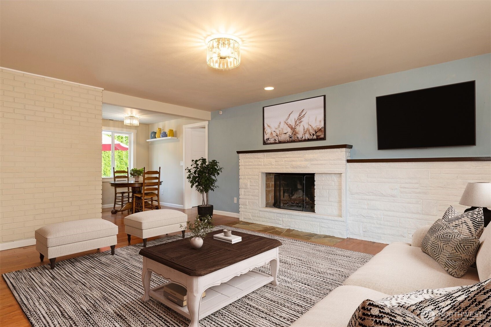 7923 220th Street Southwest Edmonds, WA 98026 - Photo 6 of 40 a living room with furniture and a fireplace