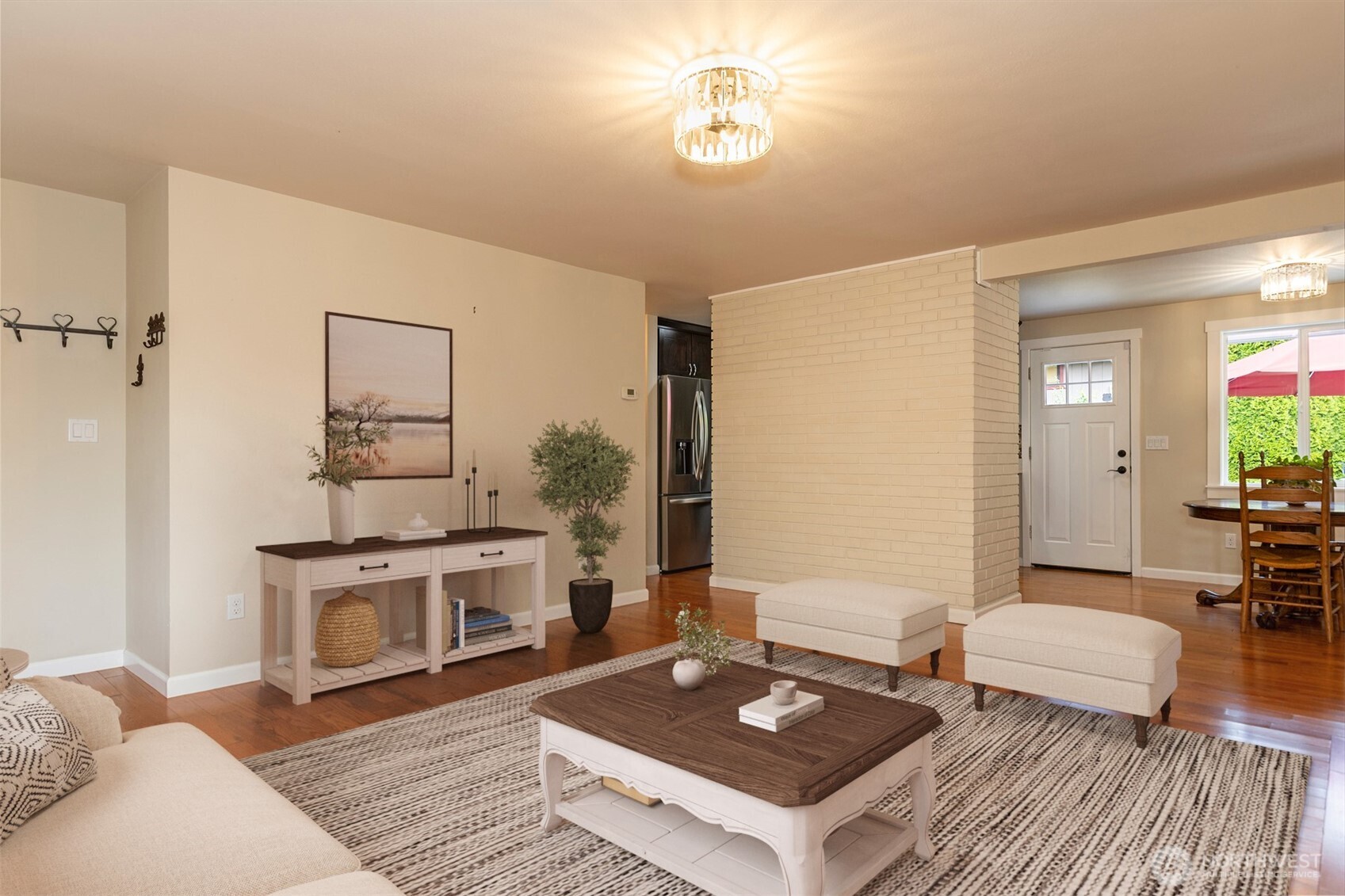 7923 220th Street Southwest Edmonds, WA 98026 - Photo 9 of 40 a living room with furniture a fireplace and a table