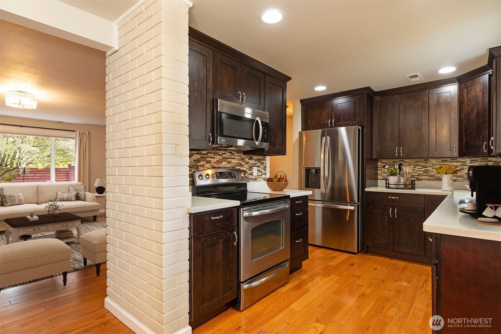 7923 220th Street Southwest Edmonds, WA 98026 - Photo 10 of 40 a kitchen with stainless steel appliances granite countertop a refrigerator stove and sink