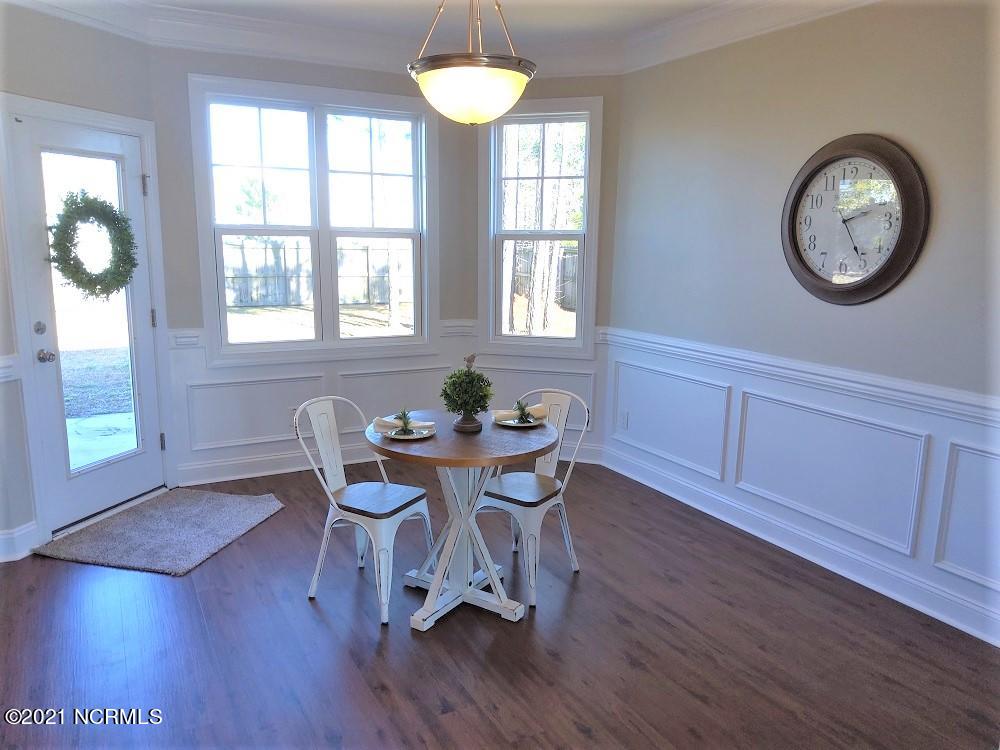 653 Morris Landing Road Holly Ridge, NC 28445 - Photo 6 of 20 653 Morris Dining 1