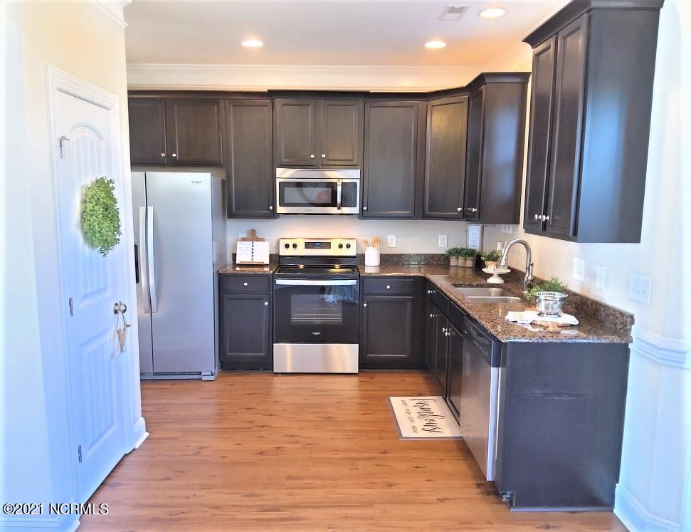 653 Morris Landing Road Holly Ridge, NC 28445 - Photo 9 of 20 653 Morris Kitchen 1