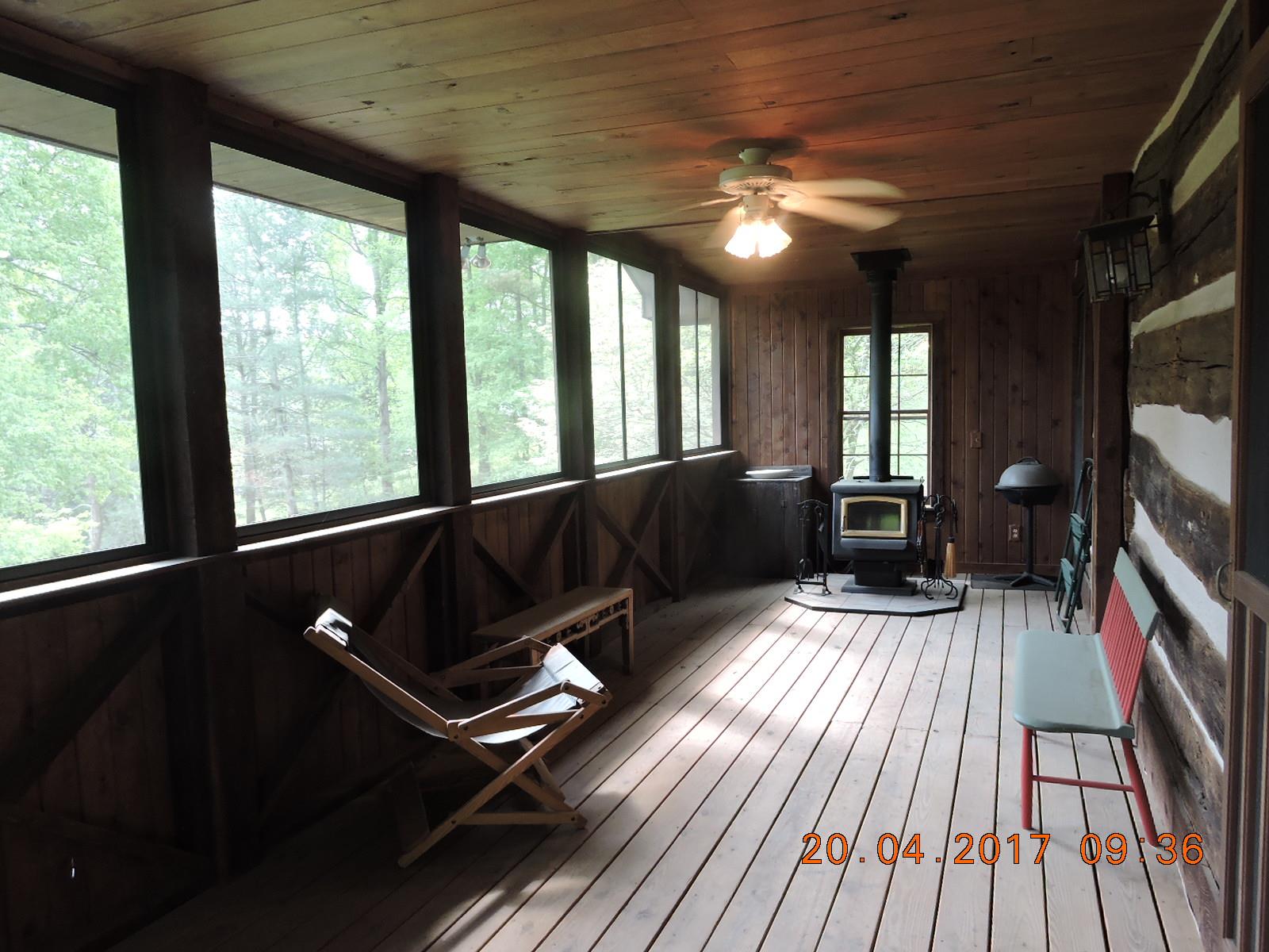 295 Lake Hill Road Manchester, TN 37355 - Photo 4 of 18 a living room with furniture fireplace and flat screen tv
