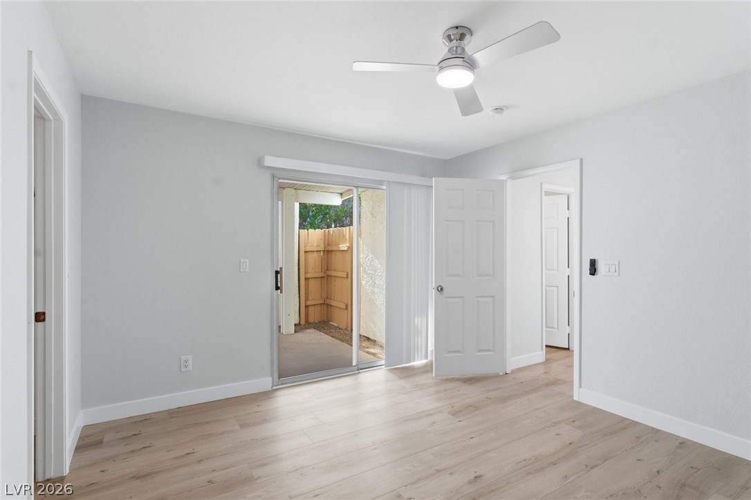 5449 Bugle Way, Unit 104 Las Vegas, NV 89108 - Photo 24 of 33 This airy room features durable flooring and convenient outdoor access for flexible living.