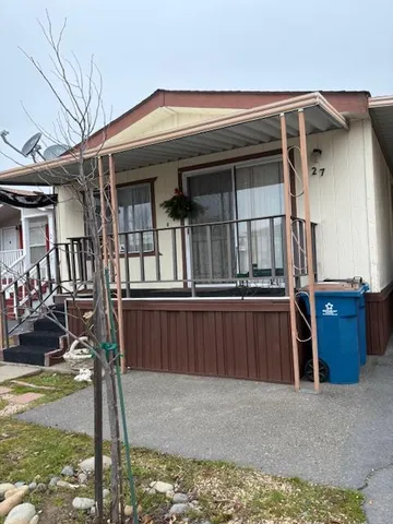 a front view of a house with balcony