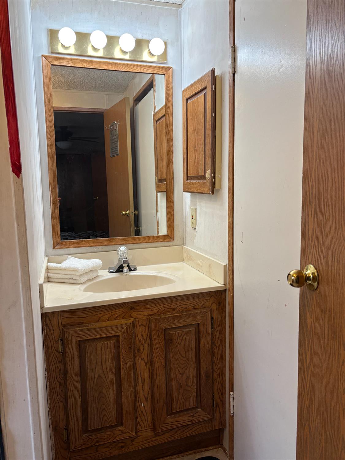 27 Golden Inn Way Rancho Cordova, CA 95670 - Photo 13 of 13 a bathroom with a sink and a mirror
