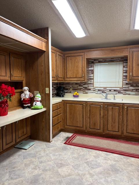 27 Golden Inn Way Rancho Cordova, CA 95670 - Photo 3 of 13 a kitchen with stainless steel appliances granite countertop a stove a sink and a microwave