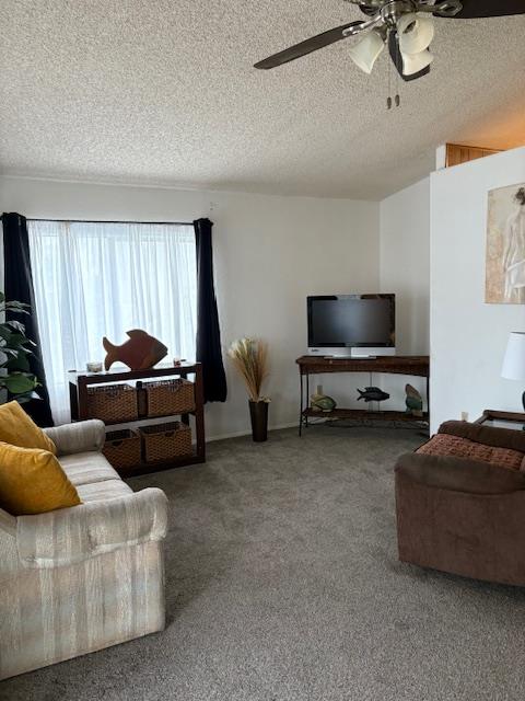 27 Golden Inn Way Rancho Cordova, CA 95670 - Photo 7 of 13 a living room with furniture a flat screen tv and a window