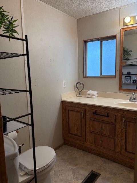 27 Golden Inn Way Rancho Cordova, CA 95670 - Photo 10 of 13 a bathroom with a sink a toilet and mirror