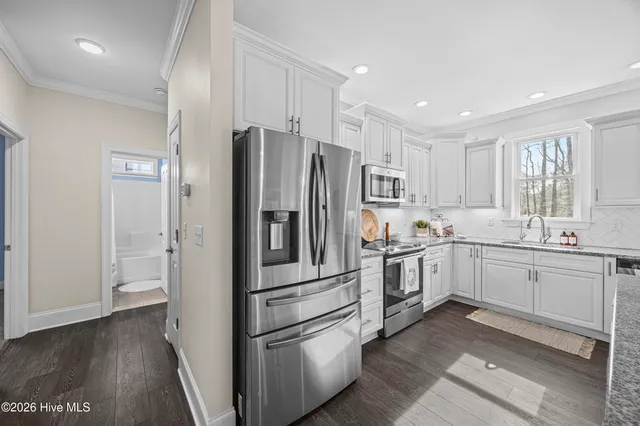 $595,000 | 376 Crown Pointe Drive, Hampstead, NC 28443