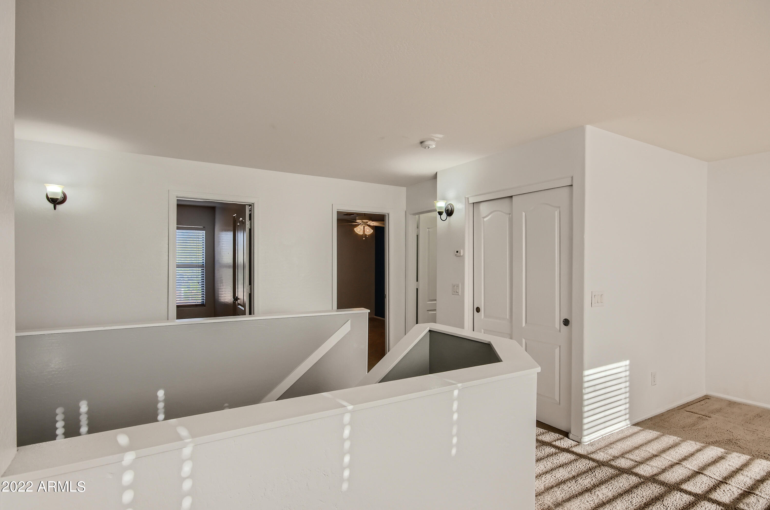 21201 North Conlon Road Maricopa, AZ 85138 - Photo 29 of 33 29-839993954-33 2nd Floor Stairway
