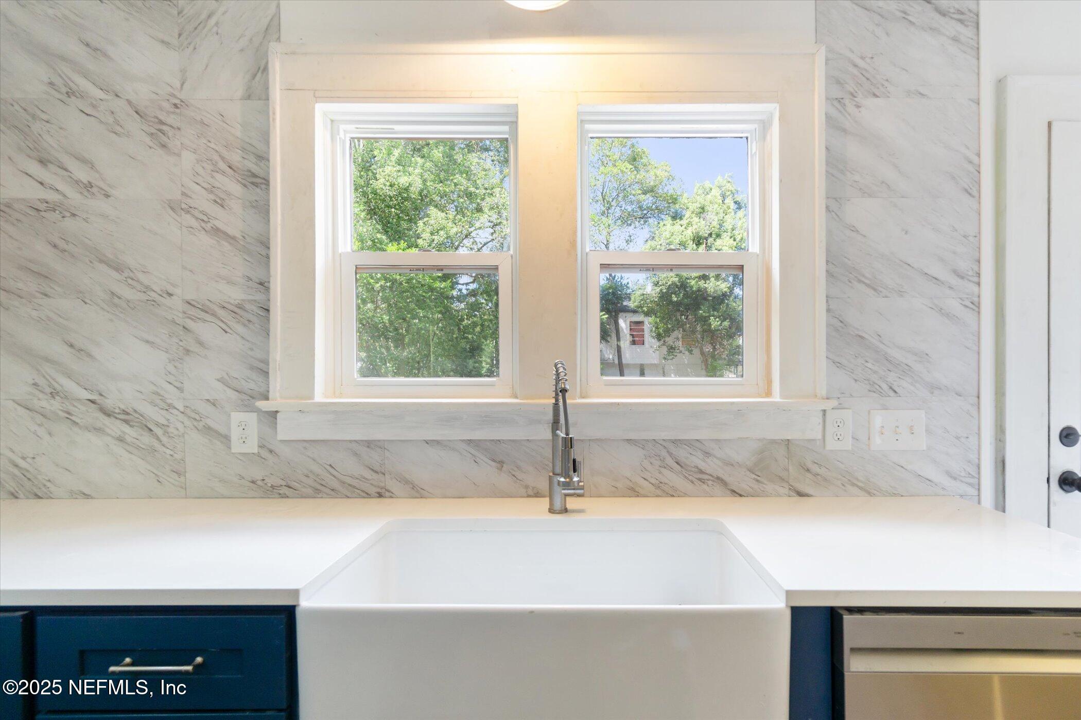 3849 Valencia Road Jacksonville, FL 32205 - Photo 18 of 30 a bathroom with a sink and a bathtub