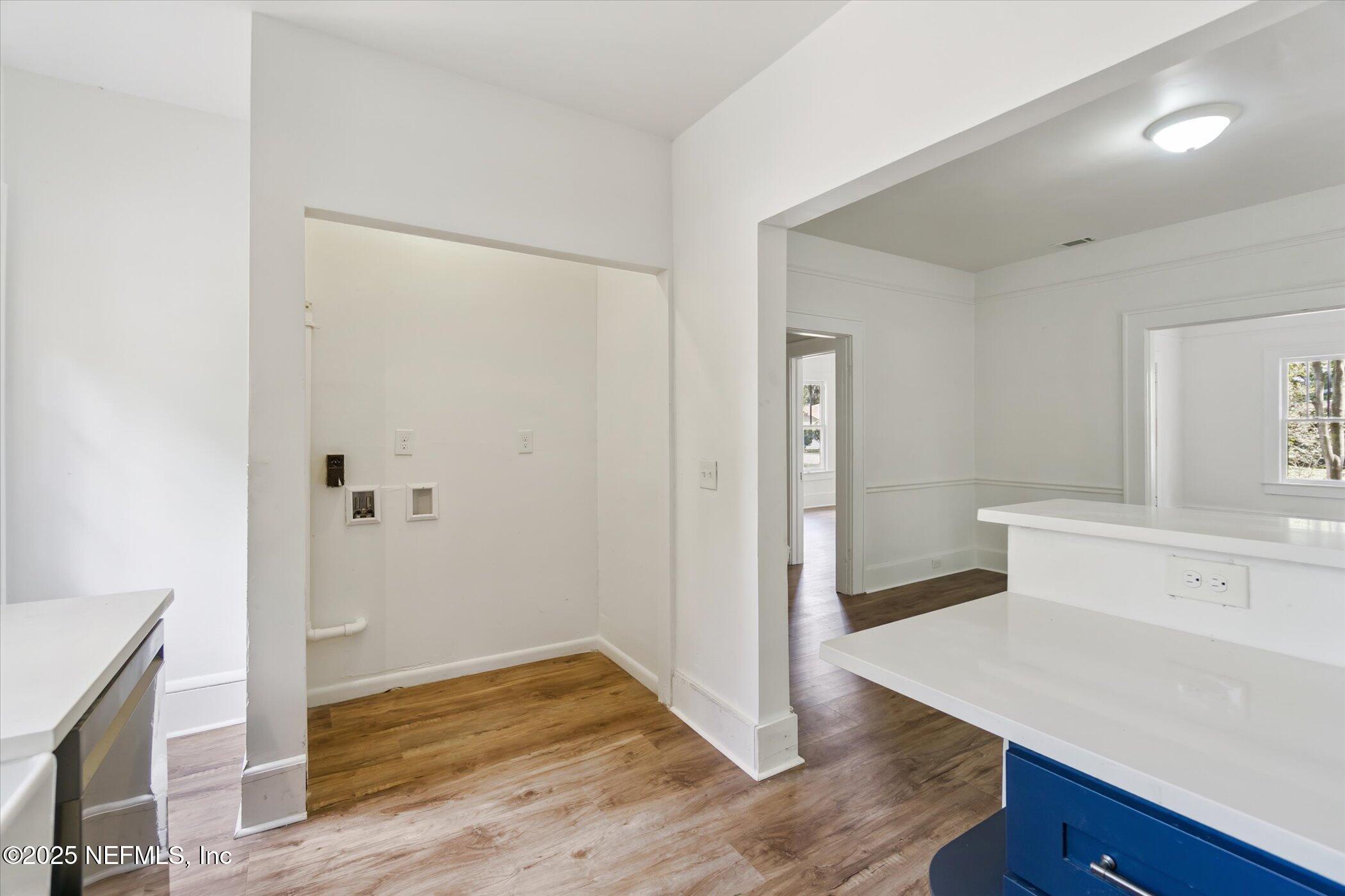 3849 Valencia Road Jacksonville, FL 32205 - Photo 19 of 30 a view of kitchen with wooden floor