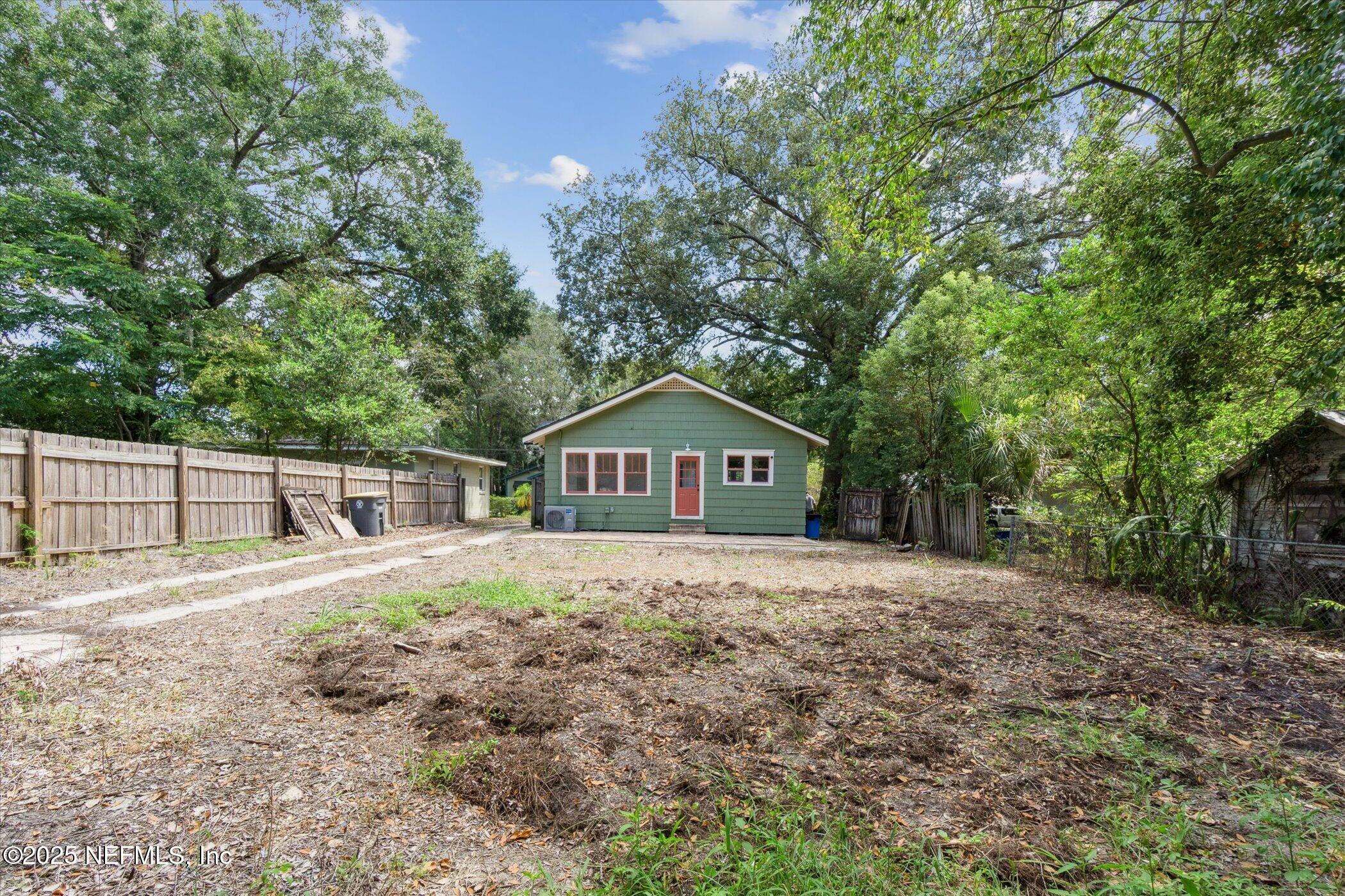 3849 Valencia Road Jacksonville, FL 32205 - Photo 29 of 30 a house with trees in the background