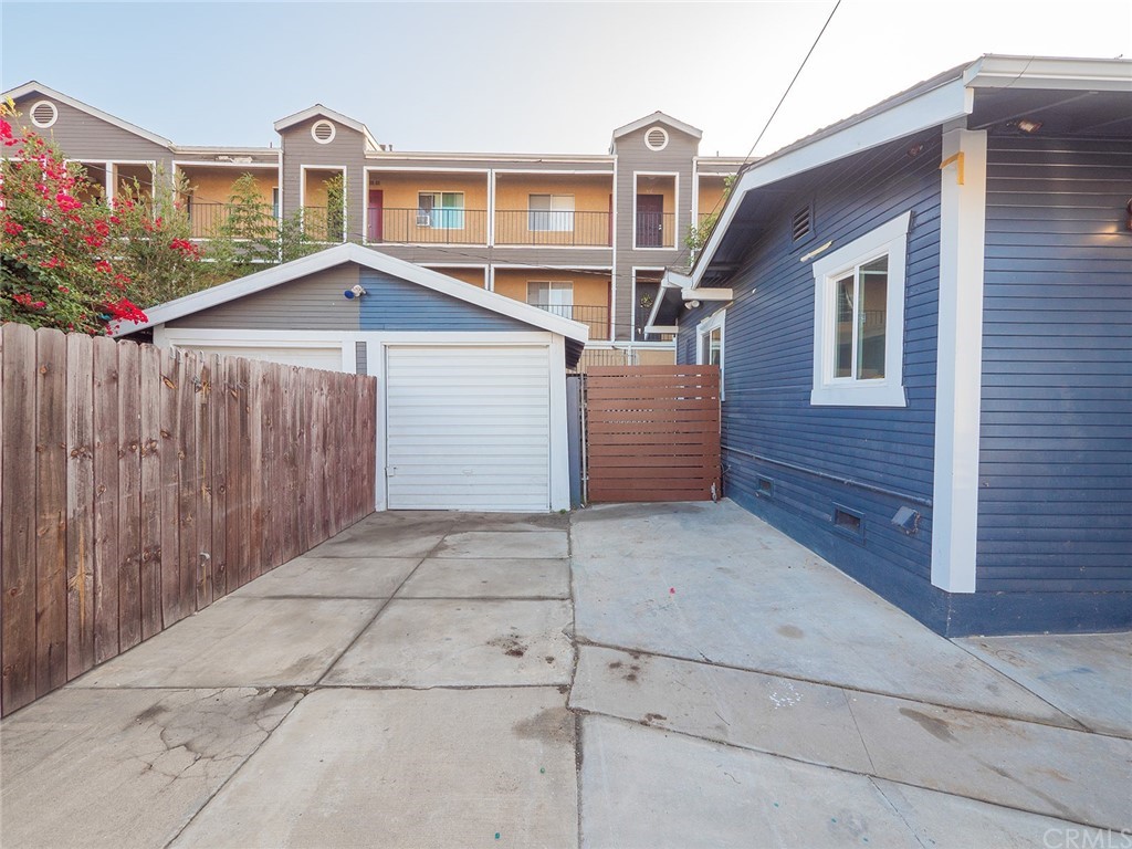 1096 Stanley Avenue Long Beach, CA 90804 - Photo 26 of 33 a front view of a house with a garage