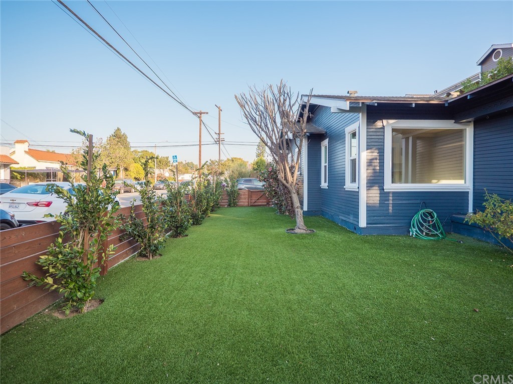 1096 Stanley Avenue Long Beach, CA 90804 - Photo 28 of 33 a front view of a house with garden