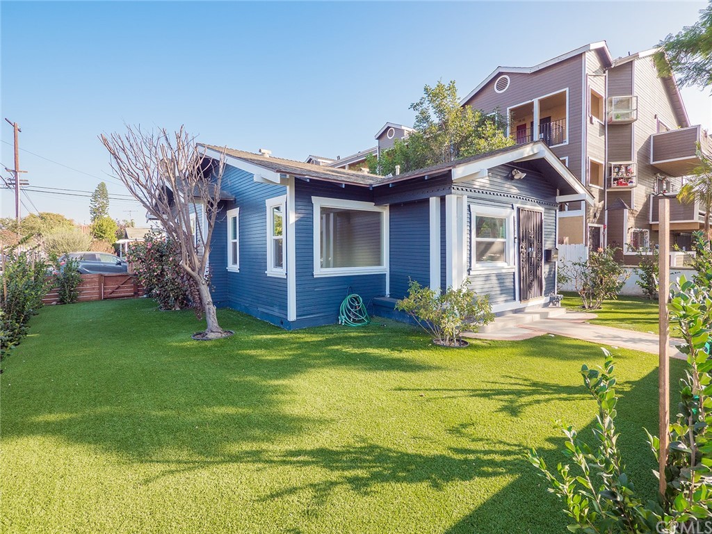 1096 Stanley Avenue Long Beach, CA 90804 - Photo 29 of 33 a view of a house with a swimming pool