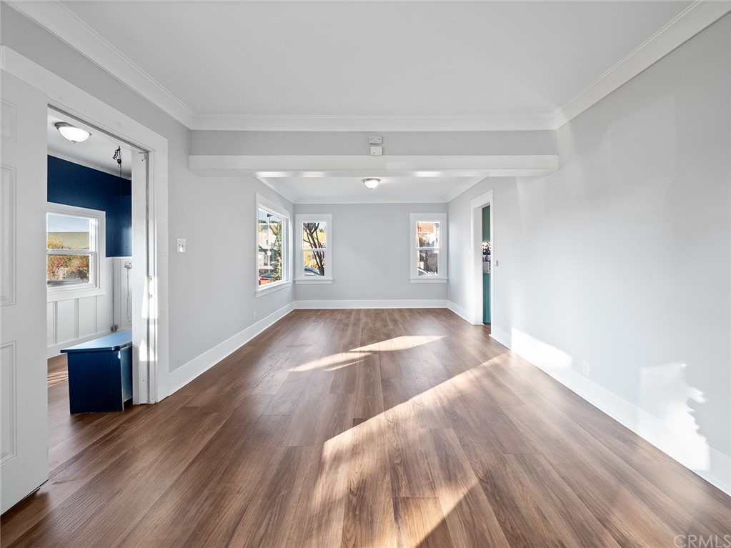 1096 Stanley Avenue Long Beach, CA 90804 - Photo 5 of 33 a view of livingroom with hardwood floor and hallway