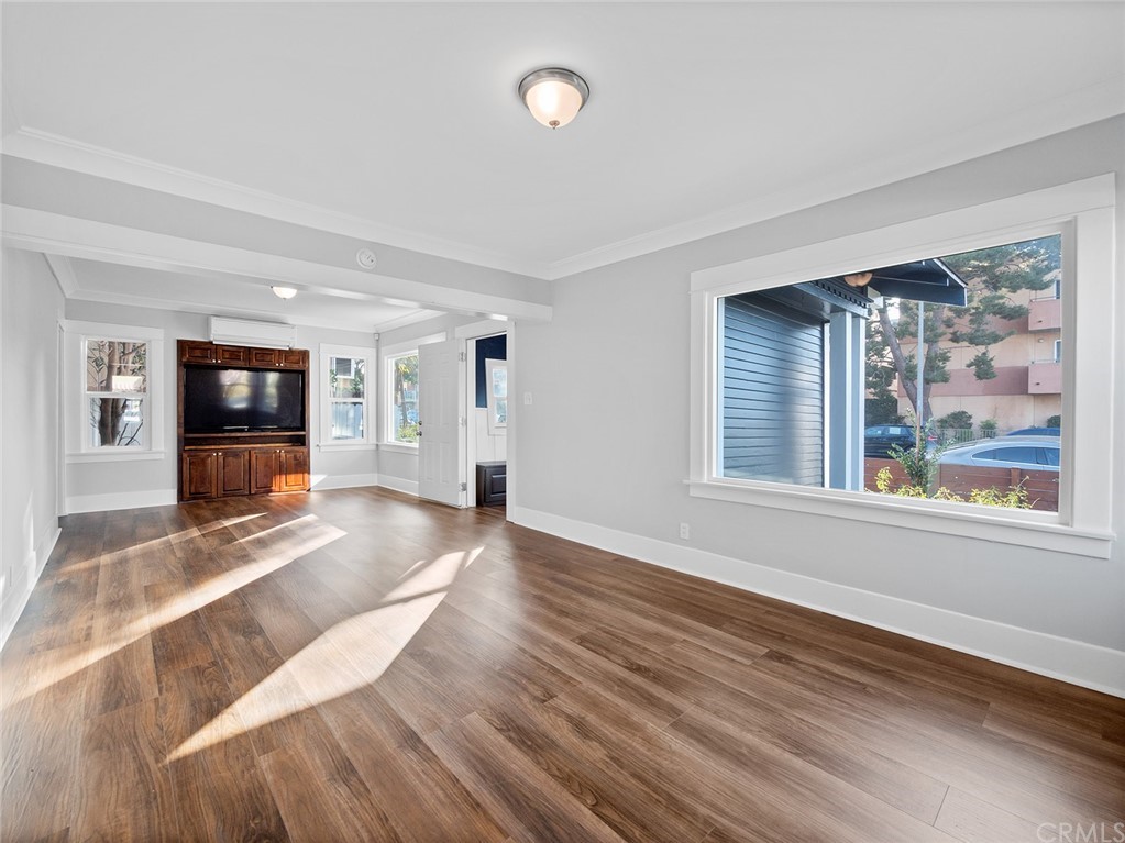 1096 Stanley Avenue Long Beach, CA 90804 - Photo 7 of 33 a view of a livingroom with wooden floor and furniture
