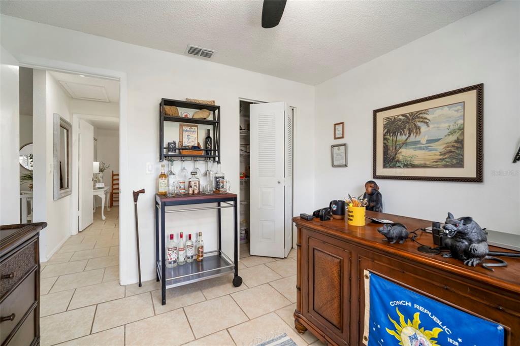 11305 Silverleaf Court Riverview, FL 33579 - Photo 13 of 39 a kitchen with stainless steel appliances kitchen island granite countertop a refrigerator and stove