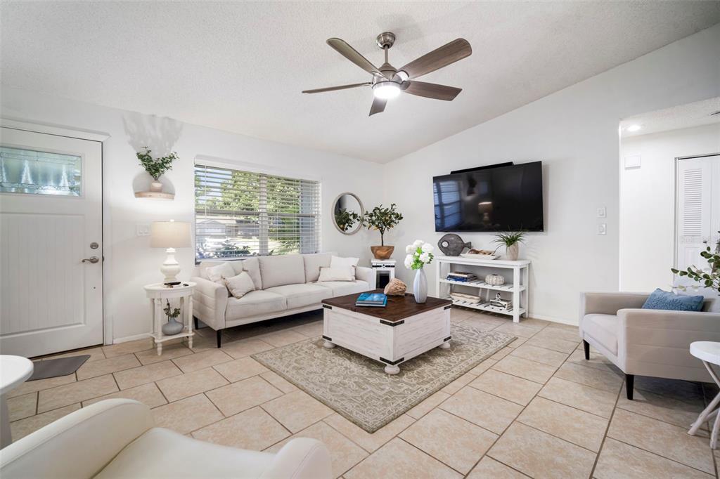 11305 Silverleaf Court Riverview, FL 33579 - Photo 15 of 39 a living room with furniture and a flat screen tv
