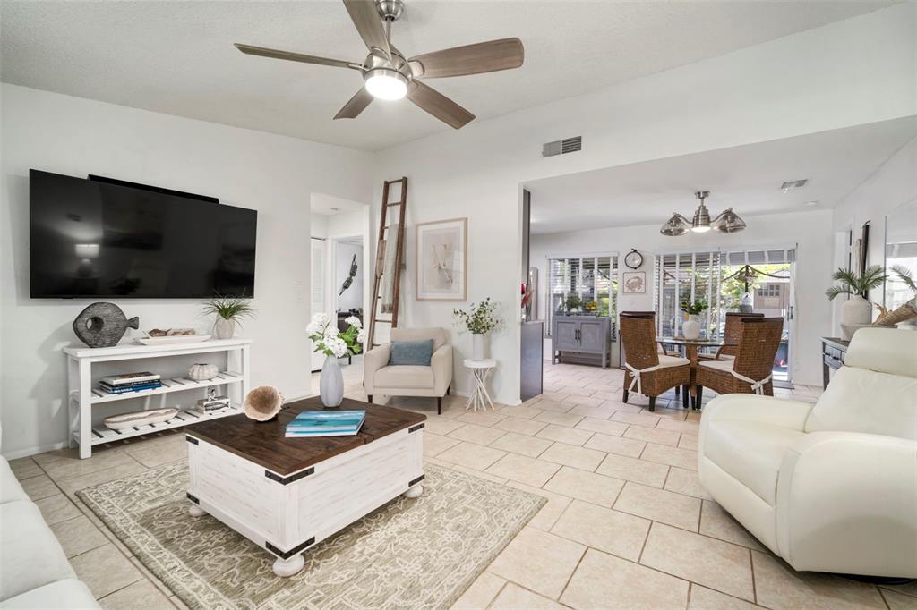 11305 Silverleaf Court Riverview, FL 33579 - Photo 16 of 39 a living room with furniture and a flat screen tv