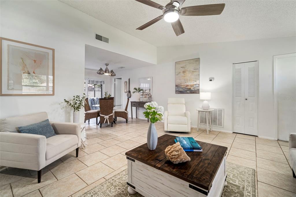 11305 Silverleaf Court Riverview, FL 33579 - Photo 17 of 39 a living room with furniture and wooden floor