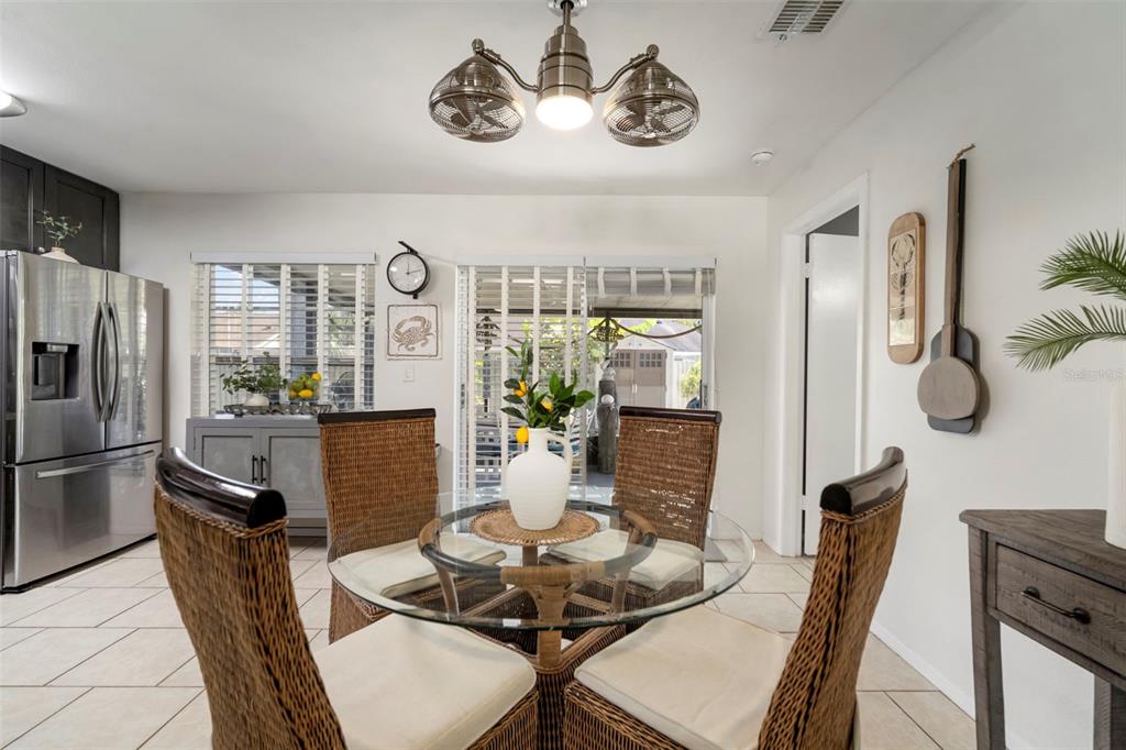 11305 Silverleaf Court Riverview, FL 33579 - Photo 18 of 39 a view of a dining room with furniture kitchen and wooden floor