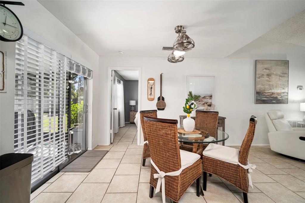 11305 Silverleaf Court Riverview, FL 33579 - Photo 20 of 39 a view of a dining room with furniture and chandelier