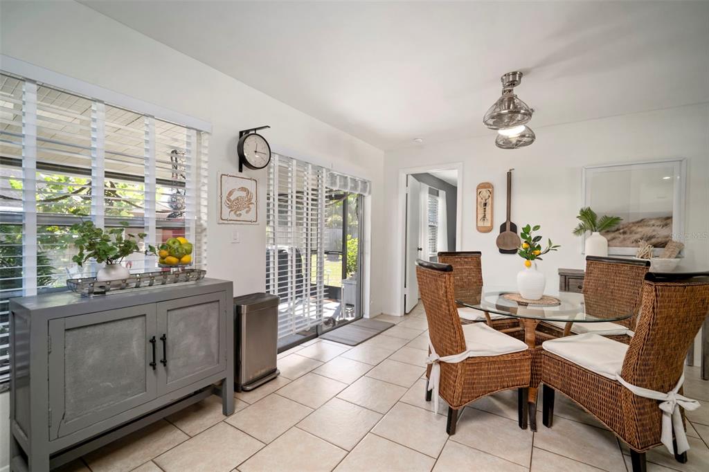 11305 Silverleaf Court Riverview, FL 33579 - Photo 24 of 39 a view of a dining room with furniture window and wooden floor