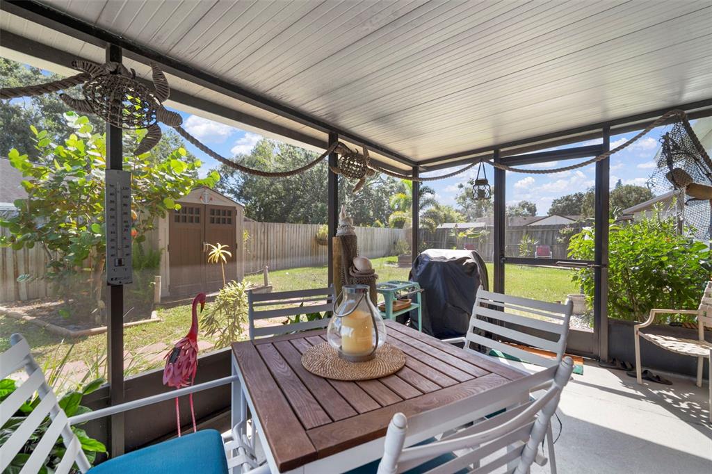 11305 Silverleaf Court Riverview, FL 33579 - Photo 33 of 39 a view of a porch with furniture and a yard