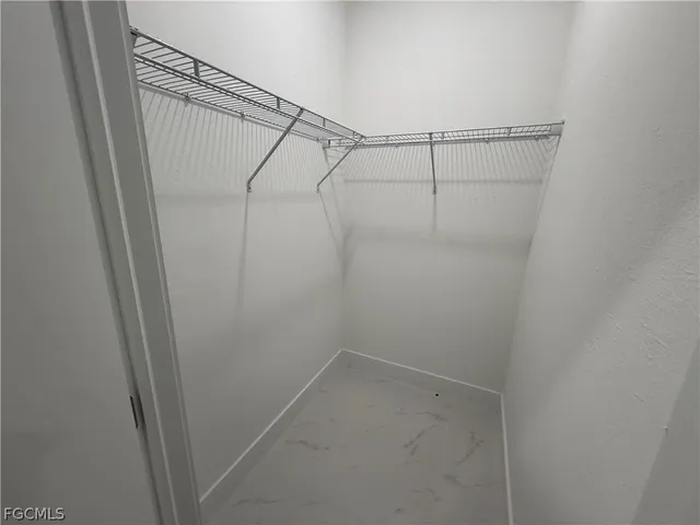 a view of a room with racks on the wall