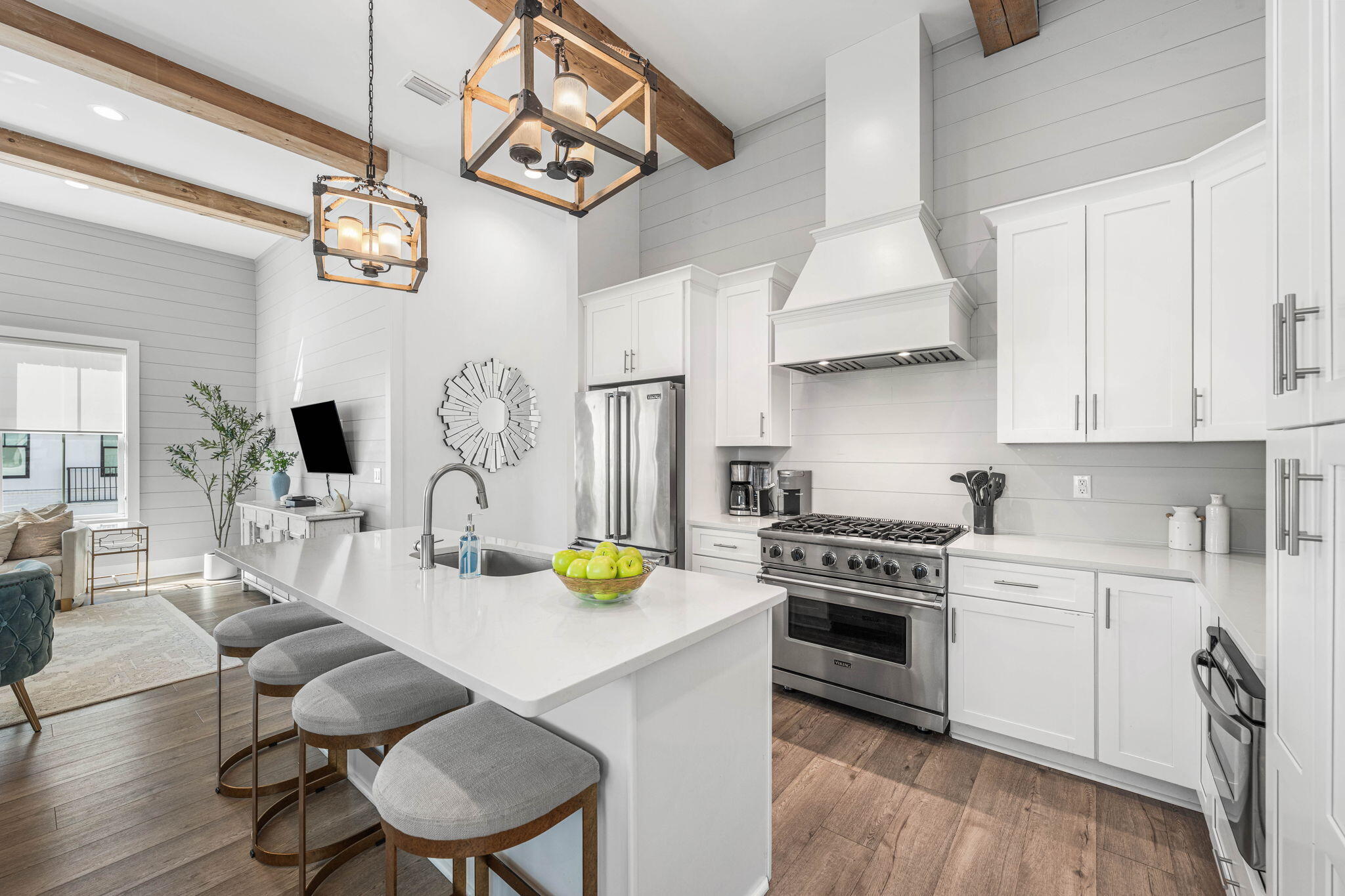 35 Cote D Azur Drive Santa Rosa Beach, FL 32459 - Photo 16 of 54 a kitchen with a sink a stove and chairs