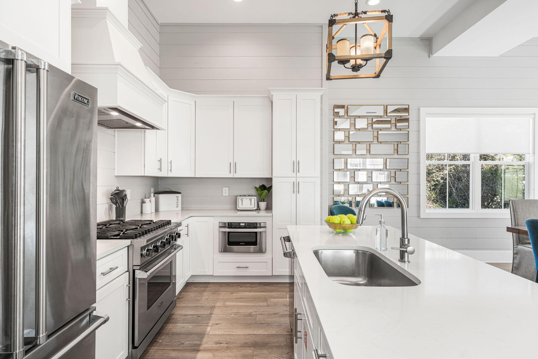 35 Cote D Azur Drive Santa Rosa Beach, FL 32459 - Photo 17 of 54 a kitchen with a sink cabinets and stainless steel appliances